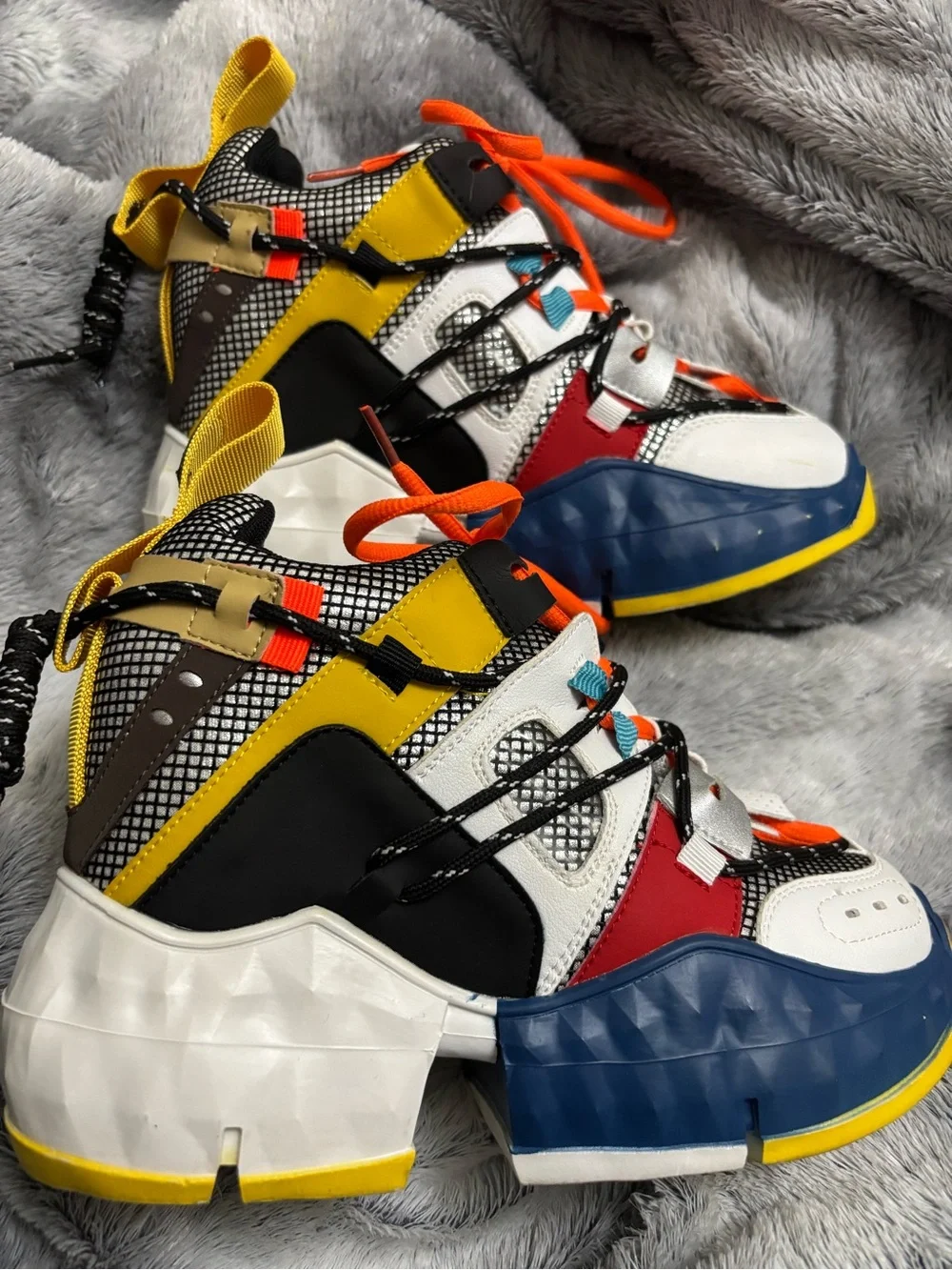 Youth White Sneakers with Blue & Yellow Soles and Orange Laces